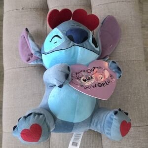 Blue and Red Plush Toy